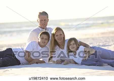 Stock Image - usa, posing, florida, scenic, beach, family. Fotosearch
