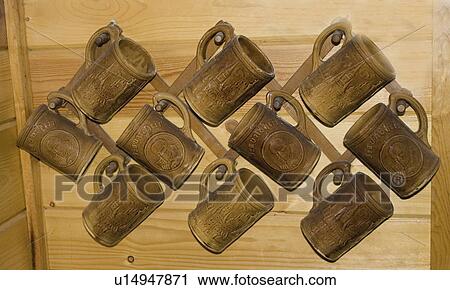 Stock Image - wall, german, hanging, mugs, beer, collection. Fotosearch
