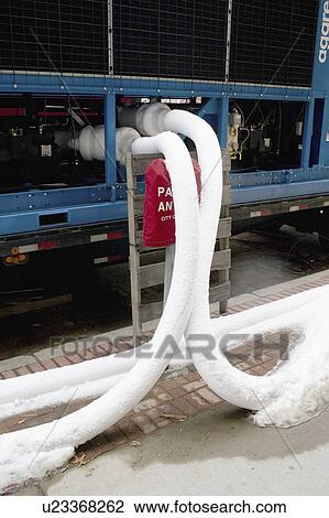 Stock Image - wells, pipes, rink, skating, flooding, water. Fotosearch