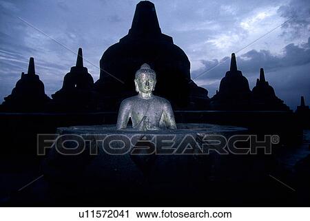 Stock Image - wheel, borobudur, dharma, turning, buddha, asia. Fotosearch