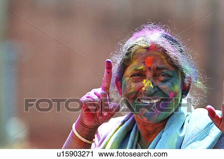 Stock Image - woman, festival, female, old, india, holi. Fotosearch
