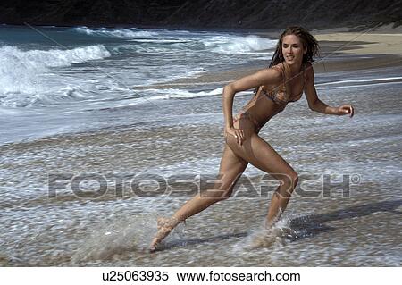 woman, running, released, ocean, away, model View Large Photo Image Stock Photography - woman, running, released, ocean, away, model. Fotosearch