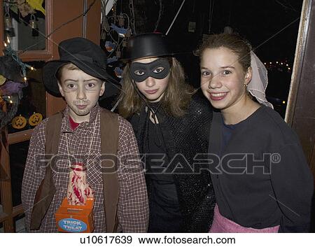 Stock Photo - 10, kids, age, treaters, trick, halloween. Fotosearch
