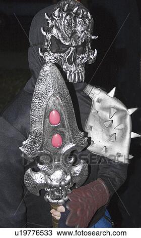 Stock Image - 14, halloween, age, spear, warrior, masked. Fotosearch
