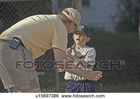 Stock Photograph - age, batter, coach, advice, getting, tball. Fotosearch