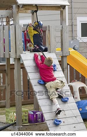 Picture - age, elevated, ramp, climbing, boy. Fotosearch