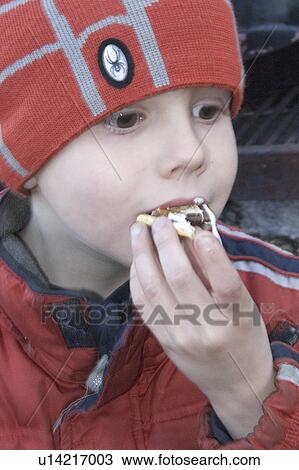 Stock Image - age, squishing, smore, eating, boy. Fotosearch