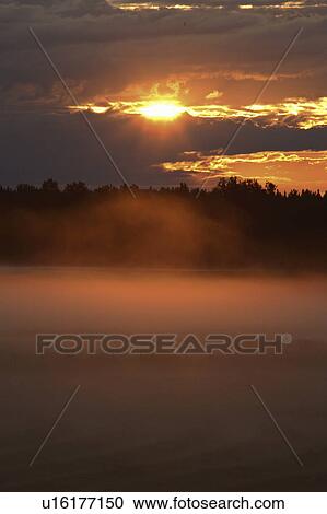 Stock Image - alberta, mist, southwestern, sundre, south, morning. Fotosearch
