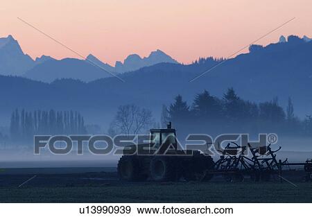 background, field, mountains, cascade, sunrise, tractor View Large Photo Image Stock Photo - background, field, mountains, cascade, sunrise, tractor. Fotosearch