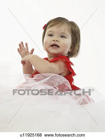 Stock Photo - background, girl, white, dress, red, little. Fotosearch