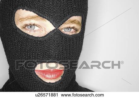 Stock Image - beauty, woman, balaclava, wearing, female, attractive. Fotosearch