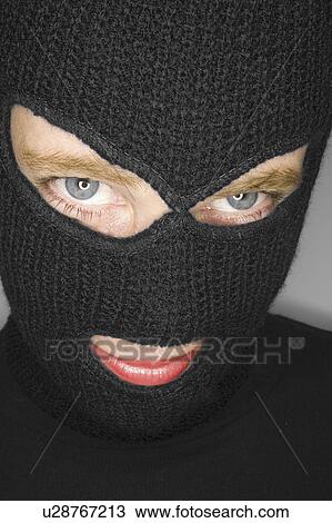 Stock Image - beauty, woman, balaclava, wearing, female, attractive. Fotosearch