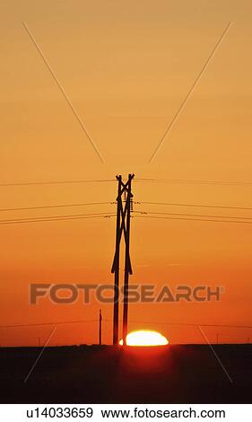 Stock Photo - behind, saskatchewan, poles, hydro, sunrise. Fotosearch
