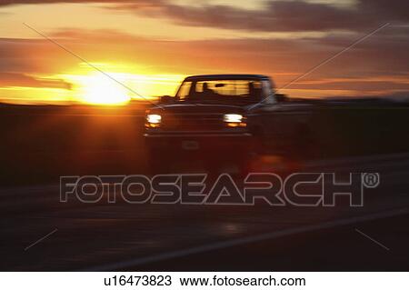 behind, scenic, car, passing, sunset View Large Photo Image Stock Image - behind, scenic, car, passing, sunset. Fotosearch