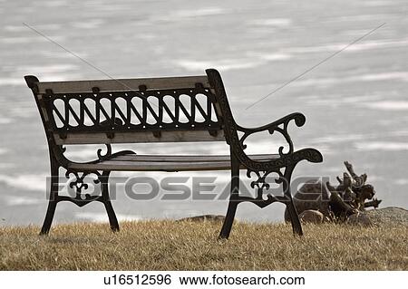 Stock Photograph - bench, lake, frozen, overlooking, park. Fotosearch