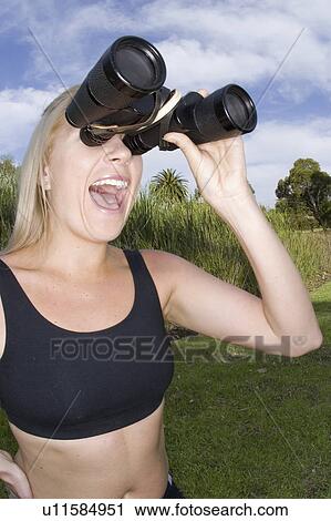 binoculars, female, pair, large, searching, woman View Large Photo Image Stock Image - binoculars, female, pair, large, searching, woman. Fotosearch