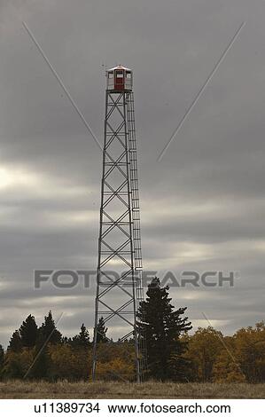 Picture - block, tower, centre, hills, cypress, fire. Fotosearch