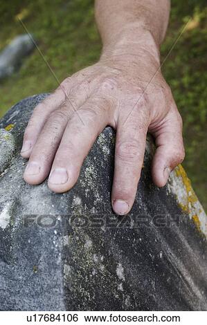 Stock Photograph - blue, resting, reunion, family, gravestone, hand. Fotosearch