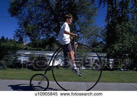 Stock Photography - boy, wheel, falls, idaho, bike, big. Fotosearch