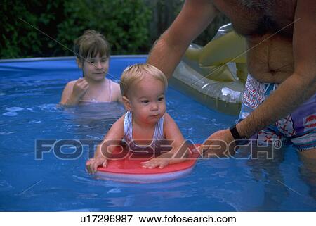 Stock Photo - brother, caucasian, baby, sister, girl, young. Fotosearch