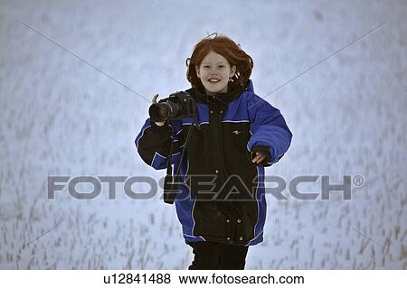 Stock Photo - canada, girl, saskatchewan, scenic, camera, young. Fotosearch