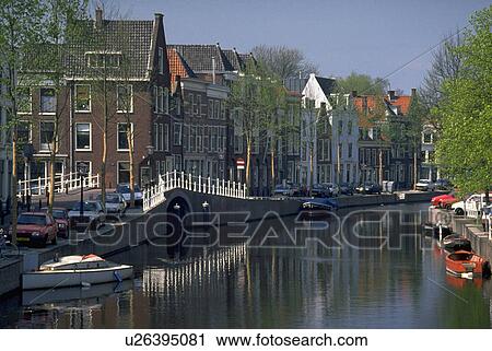 Stock Image - canal, colorful, peaceful, docked, boats, small. Fotosearch