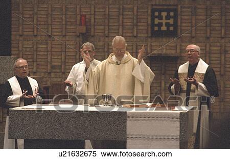 Stock Photography - church, partaking, catholic, alphonsus, communion, priests. Fotosearch