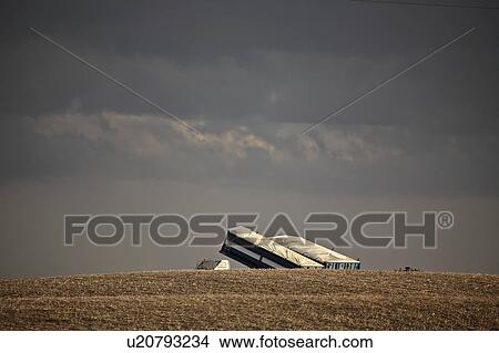 Picture - clouds, trucks, grain, storm. Fotosearch