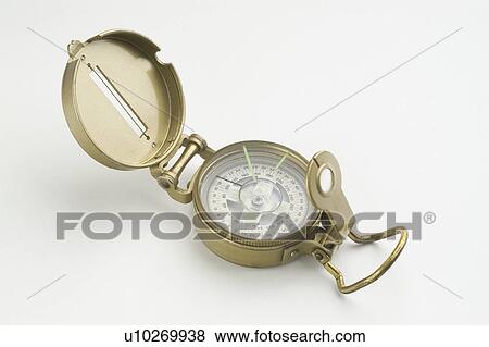 Stock Photo - compass, magneticneedle, pocketcompass, white, pocket. Fotosearch