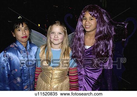 Stock Photography - costumed, treaters, trick, halloween, young. Fotosearch