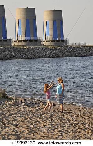 Stock Image - diefenbaker, daughter, lake, beach, enjoying, mother. Fotosearch
