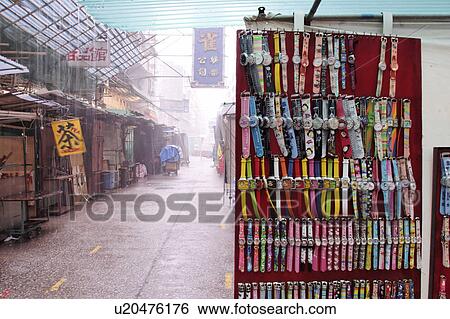 Stock Photograph - downpour, sellers, street, temple, booth, watch. Fotosearch