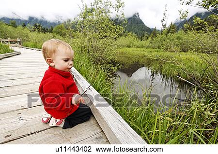 Stock Image - edge, released, sitting, girl, young, model. Fotosearch