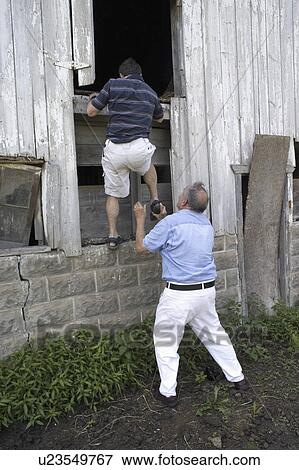 explore, climbing, barn, family, old, relatives View Large Photo Image Stock Photo - explore, climbing, barn, family, old, relatives. Fotosearch