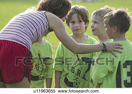 Stock Photography - expo, talking, field, carondelet, team, coach. Fotosearch