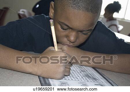 Stock Image - express, working, youth, school, homework, student. Fotosearch