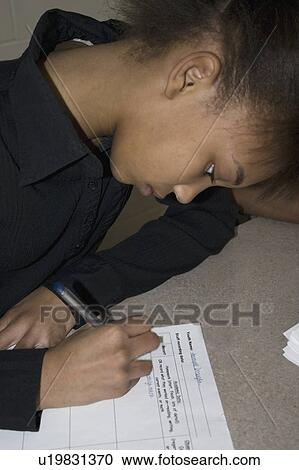 Stock Image - express, working, youth, school, homework, student. Fotosearch
