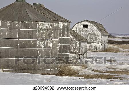 Stock Image - field, grain, covered, snow, bins, old. Fotosearch