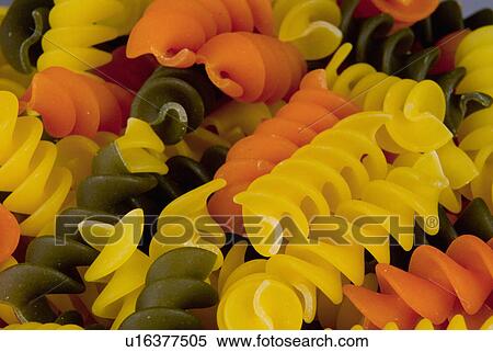 Stock Photography - flour, rotini, tomato, pasta, dry, tricolor. Fotosearch