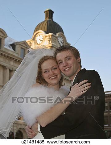 front, groom, street, main, hugging, bride View Large Photo Image Stock Photography - front, groom, street, main, hugging, bride. Fotosearch