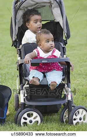 Stock Image - game, african, soccer, toddlers, american, two. Fotosearch