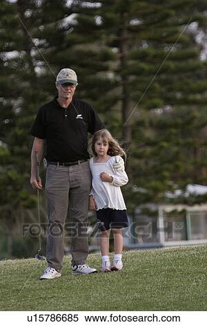 golf, girl, day, enjoying, father, little View Large Photo Image Stock Photography - golf, girl, day, enjoying, father, little. Fotosearch