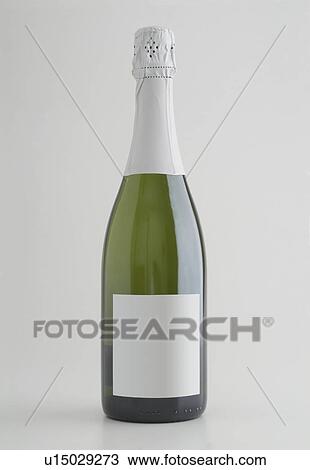 Stock Image - green, champagne, wine, label, white, bottle. Fotosearch