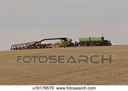 Stock Photo - harvest, machinery, field, idle, lying, farm. Fotosearch