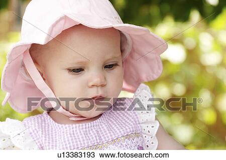 Stock Image - hat, released, sun, girl, baby, model. Fotosearch