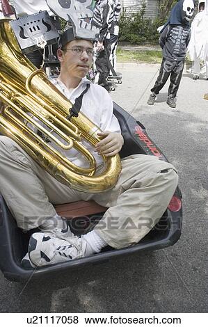 Stock Photo - heart, parade, cart, riding, musician, handicapped. Fotosearch
