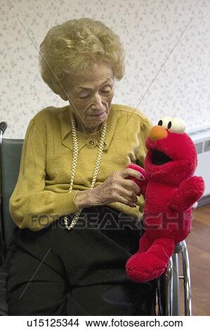 holding, woman, 94, age, female, senior View Large Photo Image Picture - holding, woman, 94, age, female, senior. Fotosearch