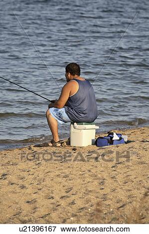 Stock Photo - lake, saskatchewan, scenic, diefenbaker, fisherman. Fotosearch