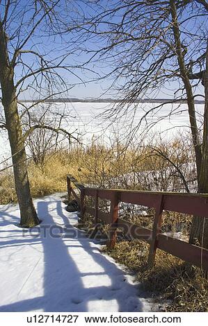 Stock Photo - lake, spring, clitherall, overlooking, snow, march. Fotosearch