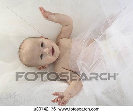 Stock Photograph - lying, baby, young, jaw, moose, happy. Fotosearch